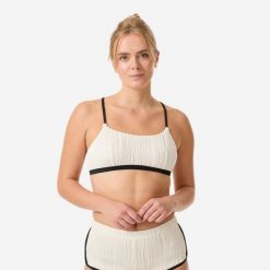 Góra kostiumu kąpielowego surfingowego damska Decathlon Katy Bonbon. Białe bikini damskie Decathlon, bez wzorów. Za 89.99 zł.