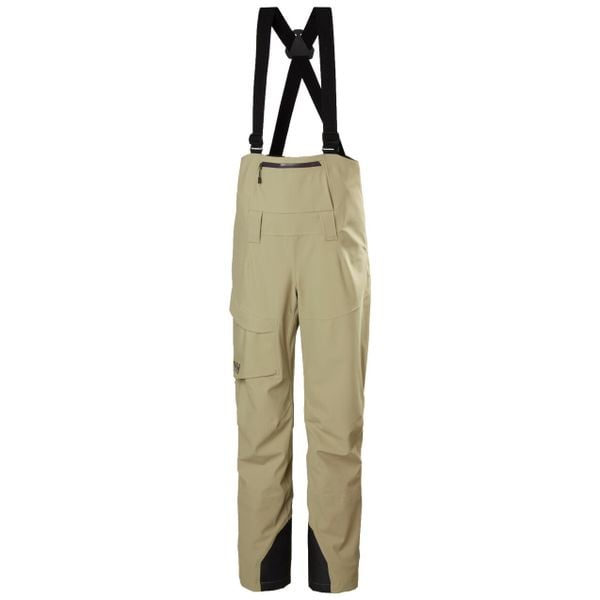 Kombinezon narciarski damski z szelkami Helly Hansen Verglas BC. Brązowe kombinezony damskie Helly Hansen, na zimę, bez wzorów, sportowe, bez kołnierzyka, bez ramiączek. W wyprzedaży za 1,190.00 zł.