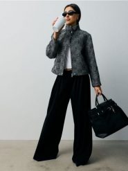 Spodnie wide leg z zakładkami - czarny. Czarne spodnie materiałowe damskie Sinsay, bez wzorów. Za 49.99 zł.