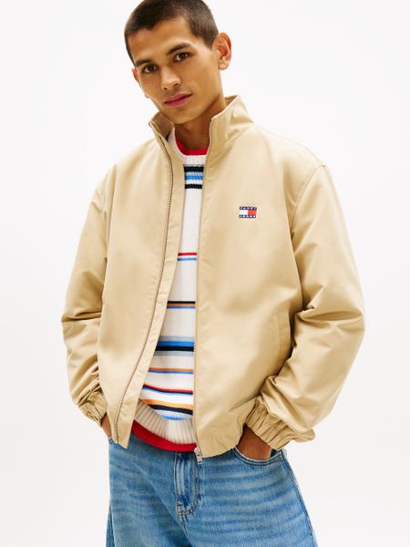 Tommy Jeans kurtka przejściowa Mężczyźni beżowy, L. Brązowe kurtki męskie Tommy Jeans, l, bez wzorów, z jeansu, sportowe, bez kaptura. Za 569.95 zł.