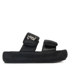 Klapki Juicy Couture. Czarne klapki damskie Juicy Couture, bez wzorów, bez obcasa. Za 249.99 zł.