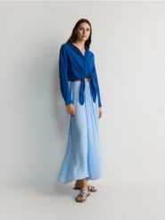 Spodnie culotte - jasnoniebieski. Niebieskie spodnie materiałowe damskie Reserved, bez wzorów, z tkaniny. W wyprzedaży za 39.99 zł.