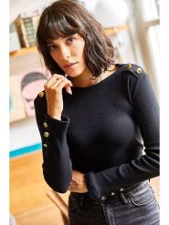 Trendyol Koszulka w kolorze czarnym rozmiar: onesize. Czarne bluzki damskie Trendyol, bez wzorów, z bawełny, bez kołnierzyka, bez ramiączek. Za 48.39 zł.