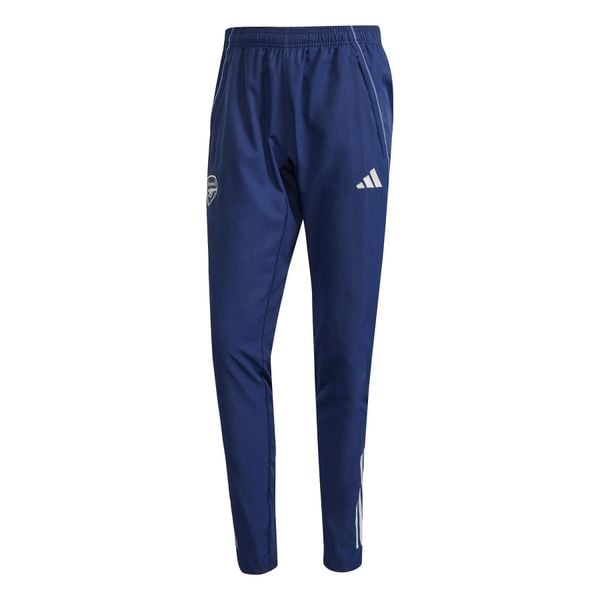 Spodnie dresowe Prematch Arsenal 2025/26. Niebieskie spodnie wizytowe męskie Adidas, z dresówki. Za 312.00 zł.
