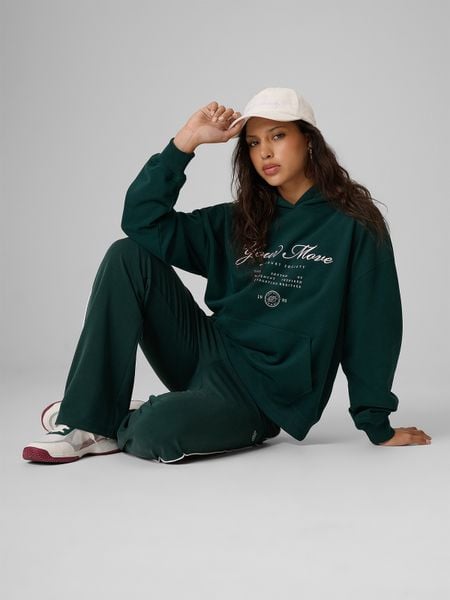 4F Bluza dresowa loose z kapturem damska - zielona S. Zielone bluzy sportowe damskie 4f, s, bez wzorów, z bawełny, bez ramiączek, z kapturem. Za 169.99 zł.