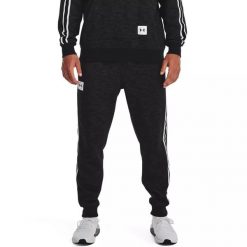 Spodnie dresowe męskie Under Armour Essential Heritage Fleece Jogger. Niebieskie spodnie dresowe męskie Under Armour, bez wzorów, z dresówki. Za 149.99 zł.
