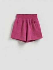 Muślinowe szorty - brudny róż. Czerwone szorty damskie Reserved, bez wzorów, z bawełny. Za 79.99 zł.