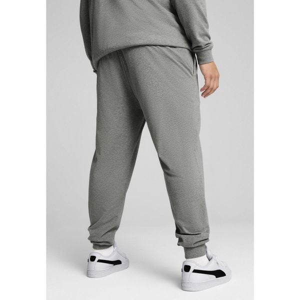 Męskie spodnie Essentials z logo No. 1 z dżerseju PUMA. Szare spodnie sportowe męskie Puma, z dżerseju. W wyprzedaży za 129.00 zł.