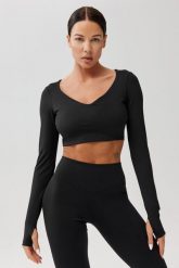 Koszulka szybkoschnąca treningowa Rough Radical Livi Tee. Czarne bluzki sportowe damskie ROUGH RADICAL, l, bez wzorów, z elastanu, bez ramiączek. Za 111.92 zł.