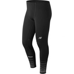 Legginsy sportowe w kolorze czarnym. Czarne spodnie sportowe męskie New Balance. W wyprzedaży za 219.95 zł.