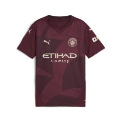 Młodzieżowa koszulka Manchester City 24/25 PUMA Dark Jasper Red. Czerwona bluzki damskie Puma, m, bez wzorów, młodzieżowe, bez kołnierzyka, bez ramiączek. W wyprzedaży za 242.25 zł.