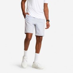 Spodenki fitness cardio męskie Domyos. Niebieskie szorty męskie DOMYOS, bez wzorów, z elastanu, sportowe. Za 49.99 zł.