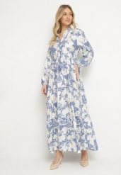 Niebieska Rozkloszowana Sukienka z Wiskozy o Koszulowym Kroju w Kwiatowy Wzór Ridisiana. Niebieskie sukienki damskie Born2be, na co dzień, l, z aplikacjami, z wiskozy, eleganckie, bez kołnierzyka, bez ramiączek, maxi, koszulowe. W wyprzedaży za 111.99 zł.
