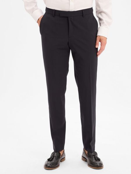 BOSS Męskie spodnie z wełny dziewiczej Baukasten - H-Gio-MM-C-NF Mężczyźni Slim Fit niebieski jednolity, 48. Niebieskie spodnie materiałowe męskie Boss, bez wzorów, z wełny. Za 599.95 zł.