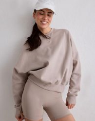 Damska bluza biegowa oddychająca, odprowadzająca wilgoć Le Run ciemna glina. Brązowe bluzy bez kaptura damskie Aim'n, s, z bawełny. Za 381.00 zł.