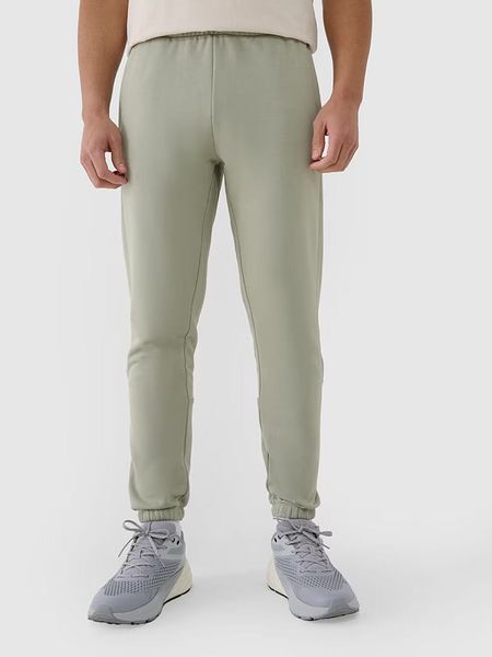 4F Spodnie dresowe w kolorze zielonym rozmiar: L. Zielone spodnie dresowe męskie 4f, bez wzorów, z dresówki. Za 99.80 zł.