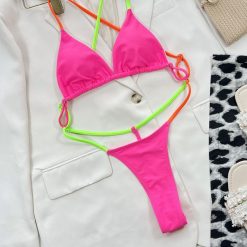 Strój kąpielowy stringi elastyczny materiał plaża aktywności wodne Benedetta. Czerwone stringi damskie Intica, l, bez wzorów, z materiału. Za 129.00 zł.