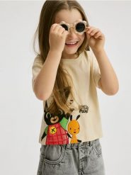 Bawełniany t-shirt Bing - beżowy. Brązowe koszulki dziewczęce Reserved, m, bez wzorów, z bawełny, bez ramiączek. W wyprzedaży za 25.99 zł.