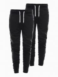 Zestaw spodni męskich dresowych BASIC - 2 pak czarne V5. Czarne spodnie dresowe męskie Ombre Clothing, z aplikacjami, z bawełny. W wyprzedaży za 82.49 zł.