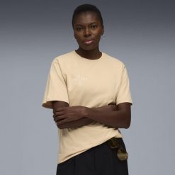 Damska koszulka piłkarska FtblEdition PUMA. Brązowe bluzki damskie Puma, bez wzorów, sportowe, bez kołnierzyka, bez ramiączek. Za 129.00 zł.