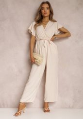 Jasnobeżowy Kombinezon z Wiskozy Zotolio. Brązowe kombinezony damskie Renee, na lato, m, bez wzorów, z materiału, eleganckie, bez kołnierzyka, bez ramiączek, długie. Za 49.99 zł.