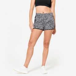 Spodenki fitness damskie Domyos wzór w panterkę. Białe spodenki sportowe damskie DOMYOS, bez wzorów, z materiału, sportowe. W wyprzedaży za 24.99 zł.
