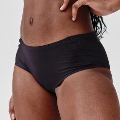Bokserki sportowe damskie. Czarne bokserki i panty damskie KALENJI, l, w ażurowe wzory, z bawełny. Za 39.99 zł.