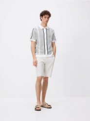 Rozpinany sweter z kołnierzem - jasnozielony. Zielone kardigany męskie Reserved, l, bez wzorów, z bawełny, bez kołnierzyka. Za 139.99 zł.