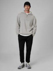 4F Spodnie casual joggery męskie - czarne XXL. Czarne spodnie materiałowe męskie 4f, bez wzorów, z bawełny, casualowe, z standardowym stanem. Za 179.99 zł.