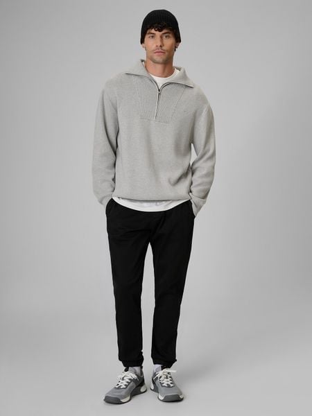 4F Spodnie casual joggery męskie - czarne XXL. Czarne spodnie materiałowe męskie 4f, bez wzorów, z bawełny, casualowe, z standardowym stanem. Za 179.99 zł.