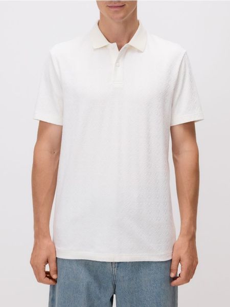 Koszulka polo regular fit - złamana biel. Koszulki polo męskie Reserved, l, bez wzorów, z bawełny, bez ramiączek. W wyprzedaży za 39.99 zł.