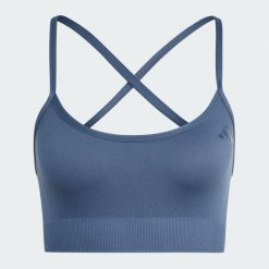 Biustonosz Workout Essentials Light-Support Knit. Niebieskie biustonosze sportowe damskie Adidas, bez wzorów, z dzianiny. Za 149.00 zł.