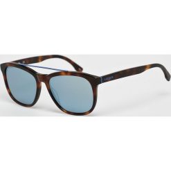 Lacoste - Okulary L822S.214. Żółte okulary przeciwsłoneczne męskie Lacoste, z materiału, prostokątne. W wyprzedaży za 229.90 zł.