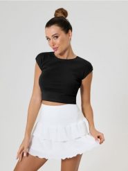 Bawełniana koszulka basic - czarny. Czarne t-shirty damskie Sinsay, l, bez wzorów, z bawełny, bez kołnierzyka. Za 15.99 zł.
