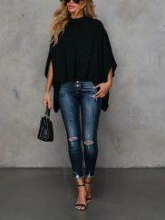 Milan Kiss Bluzka w kolorze czarnym rozmiar: S. Czarne bluzki damskie Milan Kiss, s, bez wzorów, bez kołnierzyka, bez ramiączek. Za 170.07 zł.