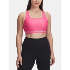 Biustonosz do jogi i pilatesu damski Under Armour Mid Crossback. Czerwone biustonosze sportowe damskie Under Armour, bez wzorów. Za 110.99 zł.