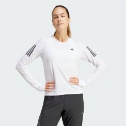 Koszulka Own The Run Long Sleeve. Białe t-shirty damskie Adidas, xs, bez wzorów, z materiału, bez kołnierzyka. Za 199.00 zł.