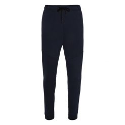 Spodnie do biegania Protest Nxgguss. Niebieskie spodnie materiałowe męskie Protest, bez wzorów, sportowe. Za 269.99 zł.