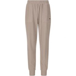 Damskie spodnie dresowe Athlecia Reiley. Brązowe spodnie dresowe damskie Athlecia, bez wzorów, z dresówki. Za 251.50 zł.