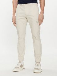 Tommy Jeans Spodnie materiałowe Austin DM0DM18940 Beżowy Slim Fit. Brązowe spodnie materiałowe męskie Tommy Jeans, bez wzorów, z bawełny. Za 359.99 zł.