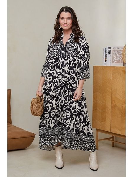 Curvy Lady Sukienka w kolorze czarno-białym rozmiar: 48/50. Białe sukienki damskie Curvy Lady, bez wzorów, z wiskozy, klasyczne, bez kołnierzyka, bez ramiączek, maxi, rozkloszowane. Za 110.04 zł.