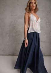 Granatowa Rozkloszowana Spódnica z Bawełny w Stylu Preppy Petrra. Niebieskie spódniczki damskie Renee, bez wzorów, z bawełny, maxi, dopasowane. Za 149.99 zł.