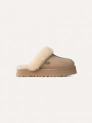 UGG Skórzane kapcie "Disquette" w kolorze beżowym rozmiar: 36. Brązowe kapcie damskie Ugg, ze skóry. Za 550.36 zł.