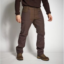 Spodnie Solognac 540 wzmocnione. Brązowe spodnie materiałowe męskie SOLOGNAC, bez wzorów, z bawełny, sportowe. Za 249.99 zł.