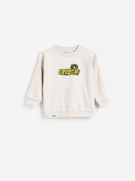 Bawełniana bluza Hot Wheels Monster Truck - jasnoszary. Szare bluzy i bluzki niemowlęce Reserved, bez wzorów, z bawełny, bez ramiączek, bez kaptura. W wyprzedaży za 22.99 zł.