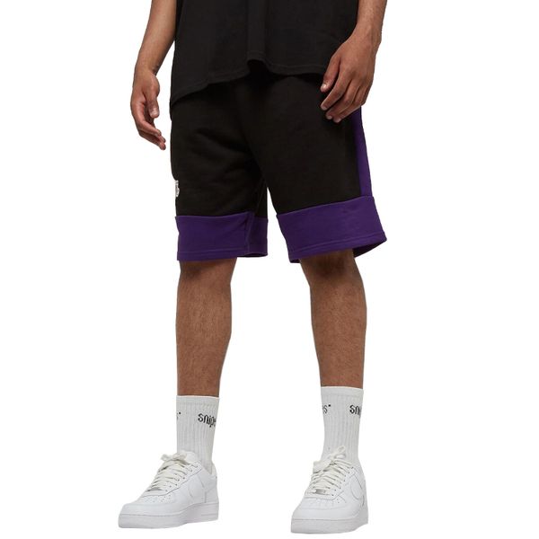 Spodnie sportowe męskie New Era Nba Colour Block Short Lakers. Czarne spodnie sportowe męskie New Era, bez wzorów, z dresówki, sportowe. Za 199.99 zł.