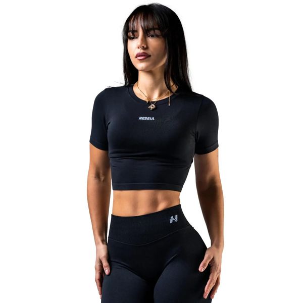 Damska koszulka bezszwowa Nebbia Power 3/4 crop. Czarne bluzki sportowe damskie Nebbia, uniwersalny, ze skóry, bez kołnierzyka, bez ramiączek. Za 229.99 zł.