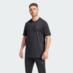 Koszulka Olympique Lyonnais Seasonal. Czarne t-shirty sportowe męskie Adidas, xl, z dzianiny, bez ramiączek, do piłki nożnej. W wyprzedaży za 125.30 zł.