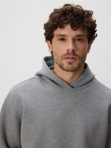 Bluza regular z kapturem - jasnoszary. Szare bluzy z kapturem męskie Reserved, l, z dzianiny. Za 149.99 zł.