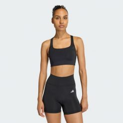 Biustonosz Optime Workout ze średnim wsparciem. Czarne biustonosze sportowe damskie Adidas, bez wzorów. Za 199.00 zł.
